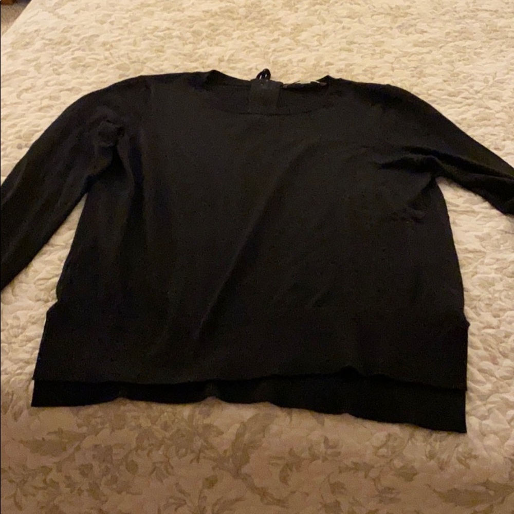 Lightweight black sweater.